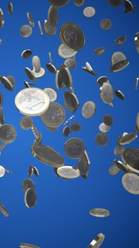 Lots of euro coins floating in the air. Vertical version.

