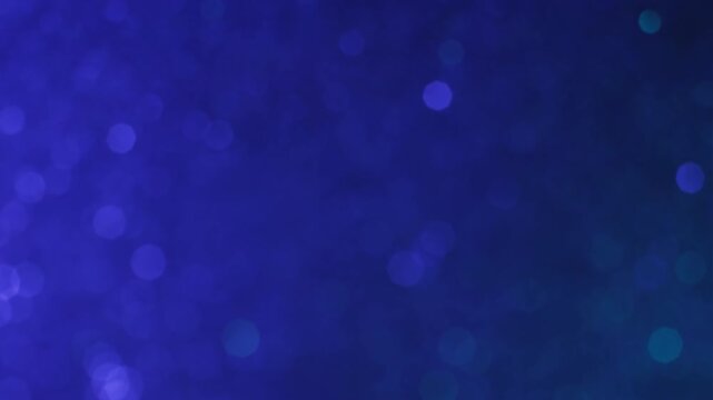 Bokeh light. Defocused sparkle reflection. Blue violet flicker luminosity. Abstract ray circles particles color transition background.