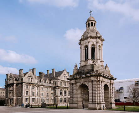 Trinity College Dublin, Historic Stone Building with Tower, Clear Sky, Campus Architecture, High-Quality Photography