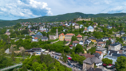 Obraz premium High Angle Aerial Panoramic View of Jajce Old Town and Historic Fortress on Hilltop in Bosnia and Herzegovina
