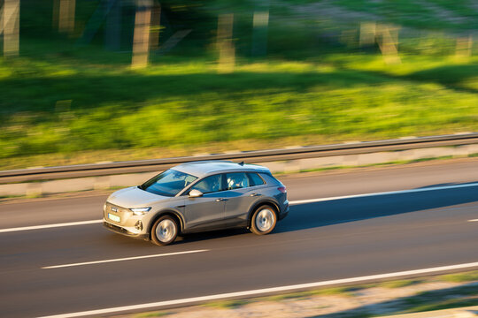 Krakow, Poland - June 05 2026: German Electric SUV driving fast on highway road captured in motion, road trip concept