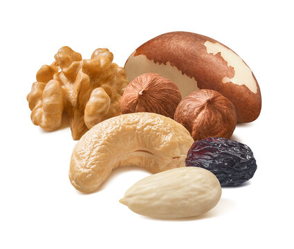 Almond, cashew, hazelnut, walnut and brazil nuts plus raisin isolated on white background.  Real photography.