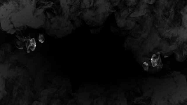 An abstract, slow-motion video showing black ink dropping from the top edge and gracefully dissolving into water against a clean white background. The ink forms dense, fluid textures expands downwards