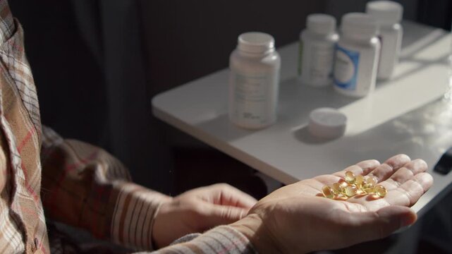 Close Up Hands Of Man Taking Medicine With Water At Home Health Treatment Concept Flu Headache Recovery Prevention And Wellness Lifestyle Scene Perfect For Medical Advertising And Healthcare Content
