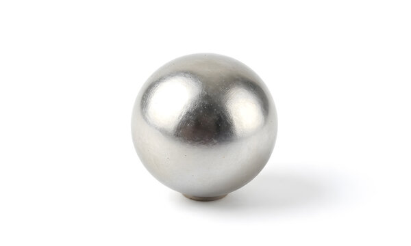 Silver ball on white surface
