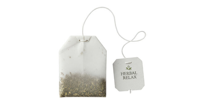 Herbal tea bag with tag during steeping concept isolated on transparent background