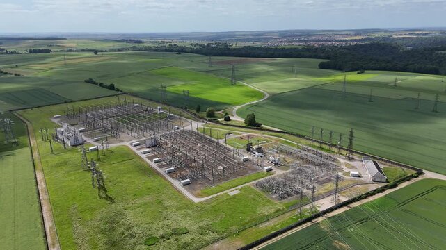 Centrale &eacute;lectrique en milieu rural. vue a&eacute;rienne des installations &eacute;lectriques, transformateurs, pyl&ocirc;nes, et cables. Meurthe-et-Moselle, Lorraine France