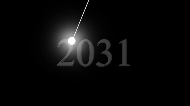 Bright white light orb pointer highlighting the dark embossed number two thousand thirty one on a solid black background
