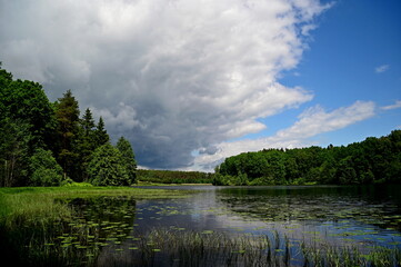 Obraz premium clouds over the river