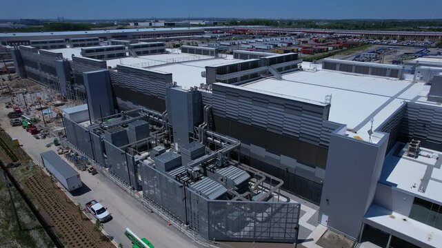 Aerial view of datacenter construction and secure cloud Infrastructure powering big data and AI Artificial Intelligence compute innovation Datacenter exterior