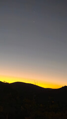 Obraz premium A beautiful sunset over the mountains of Minas Gerais.