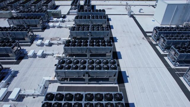 Aerial view of Hyperscale Datacenter, AI data center cooling systems, piping electrical equipment. Chilling equipment and electrical substations generators