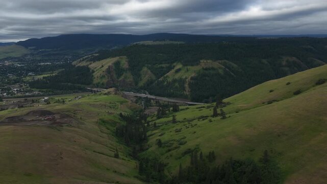Aerial of La Grande Oregon forested hillsides in spring in Wallowa mountains