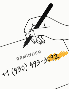 Hand holding pen writing phone number reminder note on white paper