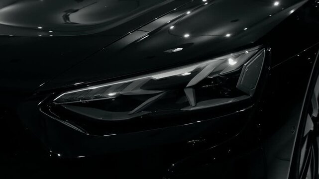 Black Luxury Car Headlight Close Up Cinematic Detail Shot in Studio