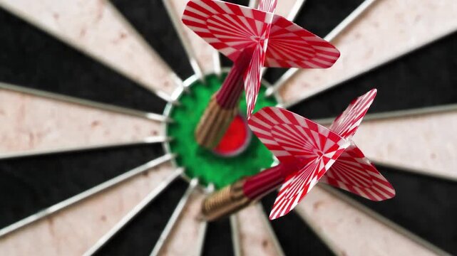 Close-up of a person throwing darts at a dartboard to hit the bullseye, representing business success and strategy.