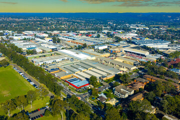 Fototapeta premium Aerial photograph of a large and developing industrial and logistics precinct in the Western Sydney town of Penrith in New South Wales, Australia