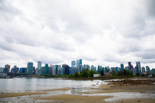 Vancouver Skyline from Stanley Park with beach in foreground