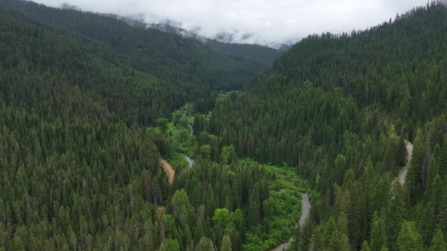 Aerial stormy skies over Saint Joe National Forest in Kellogg Idaho in spring