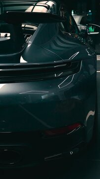 Dark Luxury Sports Car Body Curves Abstract Cinematic Detail Shot Navy Black Paint Studio Lighting