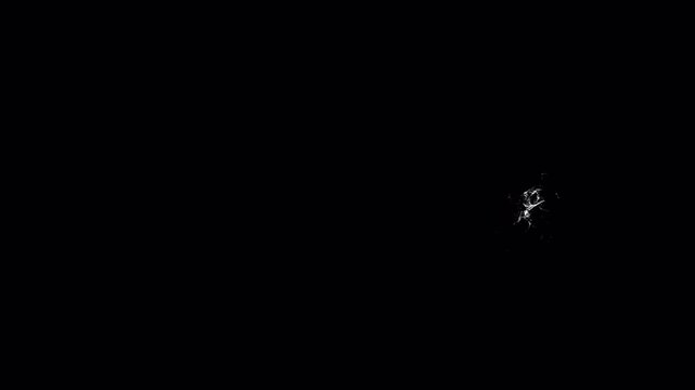 Frozen Ice Energy Projectile on Black Background with Frost Vapor Trail, Magical Winter Spell Shot and Cinematic VFX Animation Loop