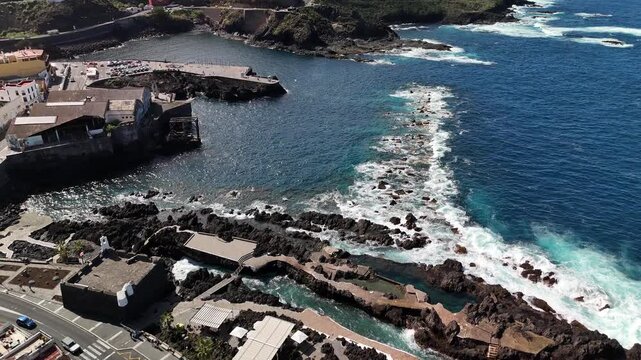 Aerial birds eye view of Garachico volcanic pools and bay, Tenerife