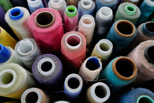 Abstract image of colorful spools of thread used in a local embroidery shop