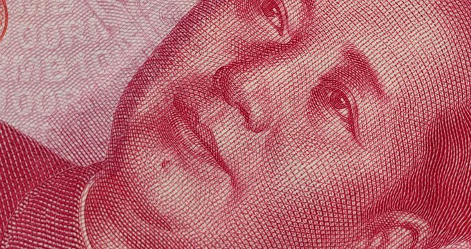Mao Tse-tung rotating portrain close up video on the 100 Yuan chinese currency banknote. Renminbi chinese money.