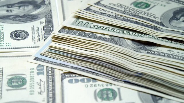 Intricate layers of cash showcase the allure of wealth and abundance. Each stack tells a story of opportunity and dreams, beautifully arranged for all to admire