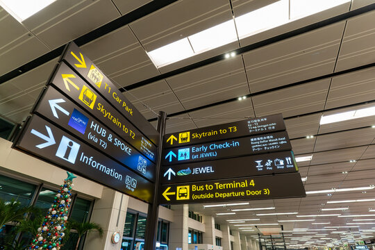Close up shot of a directional signpost at Changi Airport Terminal 1
