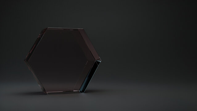 Dark hexagonal glass prism on solid gray, minimalist black copy space minimalist background, desi
