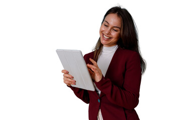 Fototapeta premium Young professional woman smiling, laughing, and interacting with a white digital tablet. She is using modern technology for business