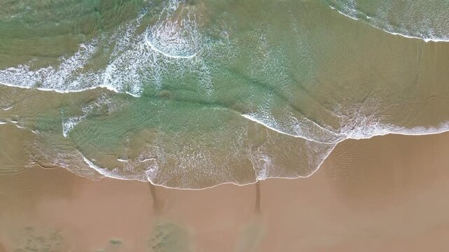 Aerial Top Down Drone View of Ocean Waves Flowing