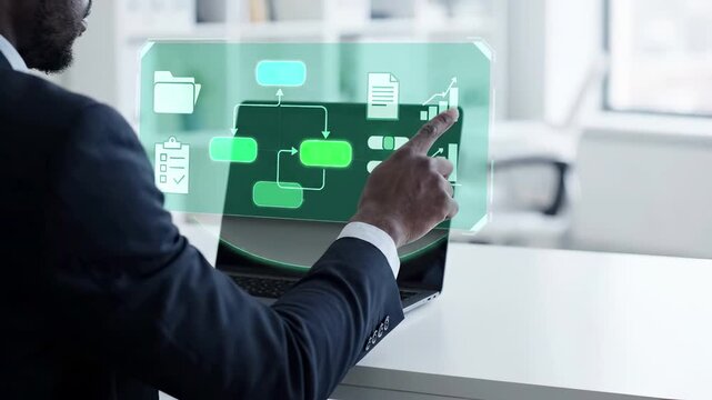 Businessman working with virtual workflow automation interface on laptop. Professional manager analyzing digital process management system with charts, documents and flowchart diagram for corporate