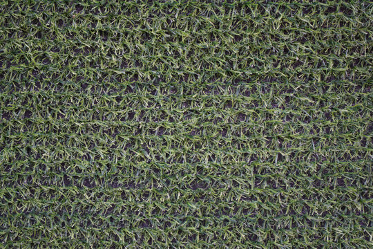 Close-up view of artificial green grass texture for landscaping