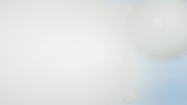 Milk molecules, milky white milk bubbles merging and falling in slow motion, milk and nutrient absorption, for dairy products, cosmetics and foods containing milk, 3D animation.