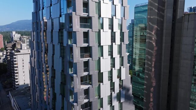Close Aerial View Modern Glass Tower Geometric Panel Facade Architecture Downtown Vancouver Canada Summer
