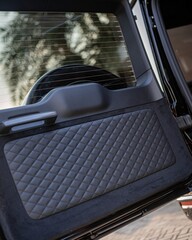 Obraz premium Quilted Car Interior Door Panel Quiet Backseat Scene.