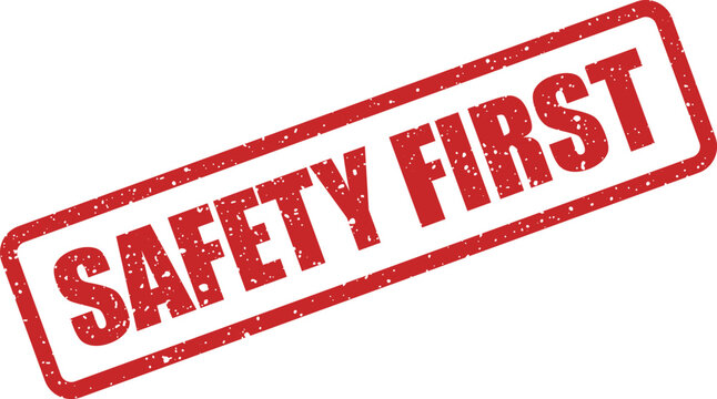 A bold red grunge rubber stamp promoting the crucial message of safety first for all operations and workplace environments