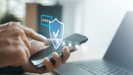 User verifying secure login on a smartphone with OTP authentication and digital security shield,...