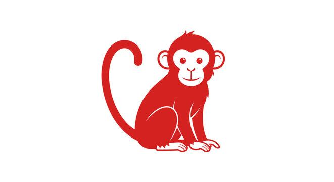 Red monkey sitting on ground looking.