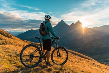 Fototapeta premium Biker watching mountain sunrise over alpine peaks adventure sport fitness landscape