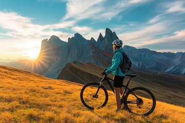 Obraz premium Biker cycling mountain dolomites italy sunset adventure landscape outdoors sport