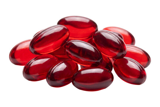 Red gelatin capsules in a pile on transparent background