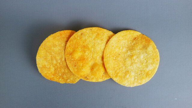 Three Round Potato Combro Chips Isolated on Gray Background
