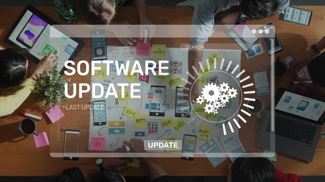 A vibrant and engaging overhead view of a team working collaboratively on a software update project with colorful notes and digital tools on a wooden table. Raster
