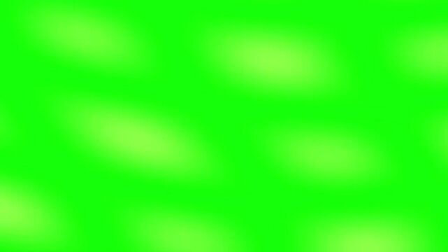 Abstract blurred green and yellow gradient background with soft bokeh light effects