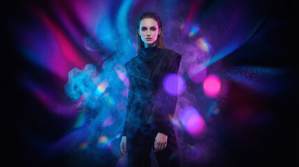 Obraz premium A vibrant cool abstract background featuring a seamless, soft gradient blend of luminous neon electric blue, radiant magenta, and deep cosmic indigo, transitioning fluidly from a pure solid black base
