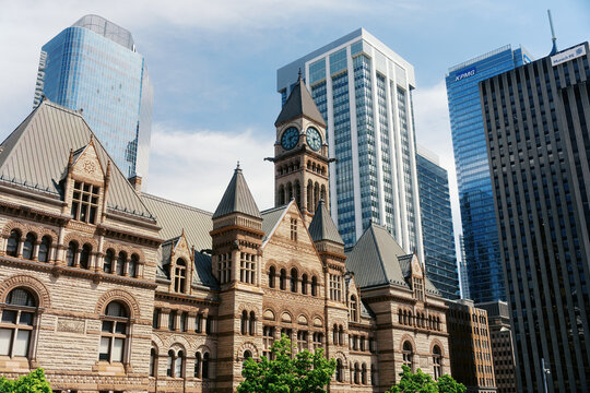 Toronto, Canada - May 26, 2026: Old City Hall Clock Tower and Modern Skyscrapers in Downtown Core