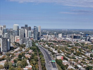 Fototapeta premium Aerial view of Montreal downtown skyline with Autoroute 720 and modern skyscrapers, Quebec, Canada. g.